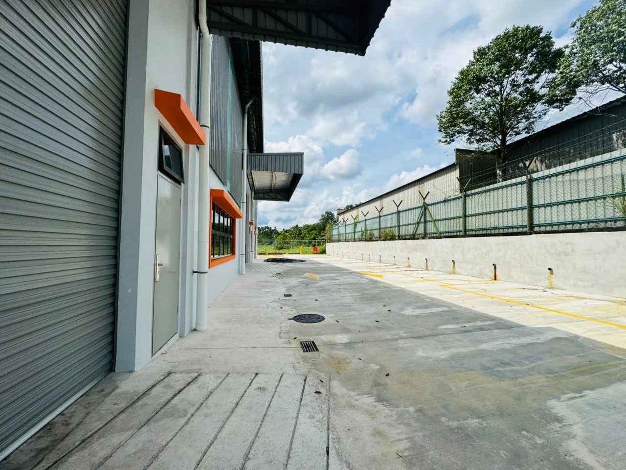 Side access beside the factory roller shutter